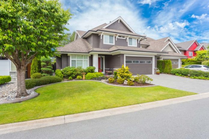 The picture of a property on a cloudy day.