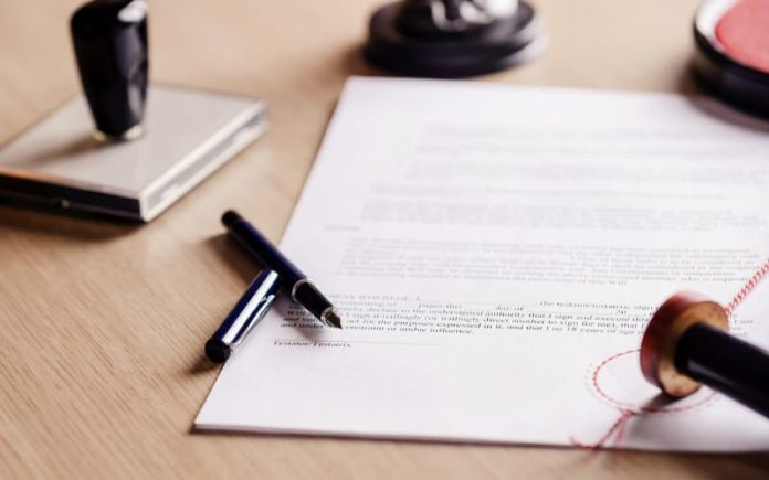 Personal legal documents laid on a table.