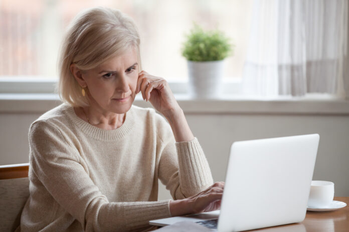 elder women working on computer