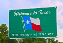 Why You Need to Move Your Wills and Trusts to Texas Texas welcome sign coming from the east on Interstate 10 with colored clouds