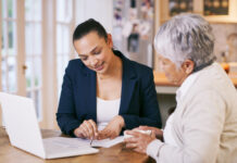 Durable power of attorney conversation between attorney and elderly woman
