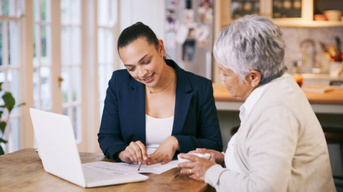 Durable power of attorney conversation between attorney and elderly woman