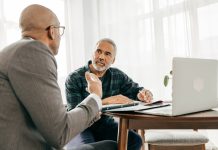 Attorney reviewing a will with a client