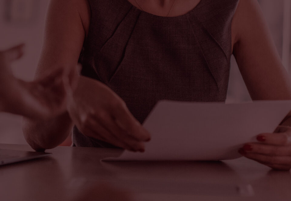 Woman holding a will document